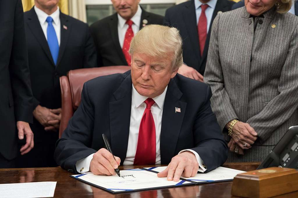 Trump signing documents 